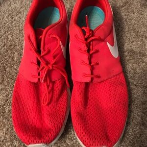 Red Nike shoes